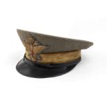 A SMOM train commander’s peack cap Gray green gabardine m. 40 peack cap with the arms of a train