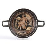 APULIAN RED-FIGURE STEMLESS KYLIX Mid 4th century BC
