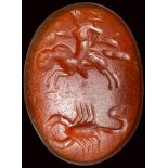 A roman carnelian intaglio. Mercury on the ram with a scorpion.