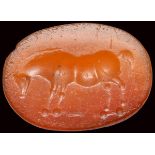 A roman italic carnelian intaglio. Horse.