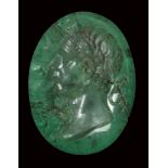 A very fine roman emerald intaglio. Bust of a ruler.