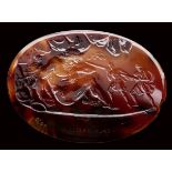 A very fine neoclassical agate intaglio signed Calandrelli. Ulysses and his companions blinding the