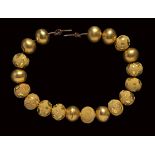 A group of 19 etruscan gold beads.