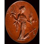 A roman red jasper intaglio. Tyche-Fortuna.