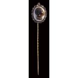 A fine victorian agate cameo set in a gold stick pin with precious stones. Moor's head.