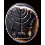 A rare and large roman sardonyx intaglio. Seven-branched menorah.