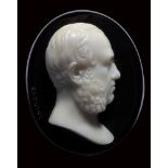 A neoclassical onyx cameo signed Saulini. Bearded gentleman.