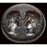 A roman republican sard intaglio. Two male portraits.