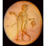 A fine roman carnelian intaglio. Satyr with attributes.