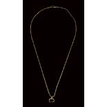 A roman gold necklace with a moon crescent pendant (lunula).