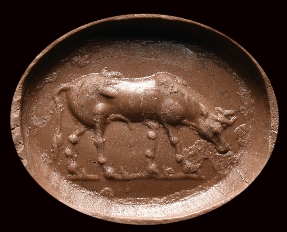 A roman italic burnt sard intaglio. Bull. - Image 2 of 2