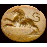 A roman yellow jasper intaglio. Lion.