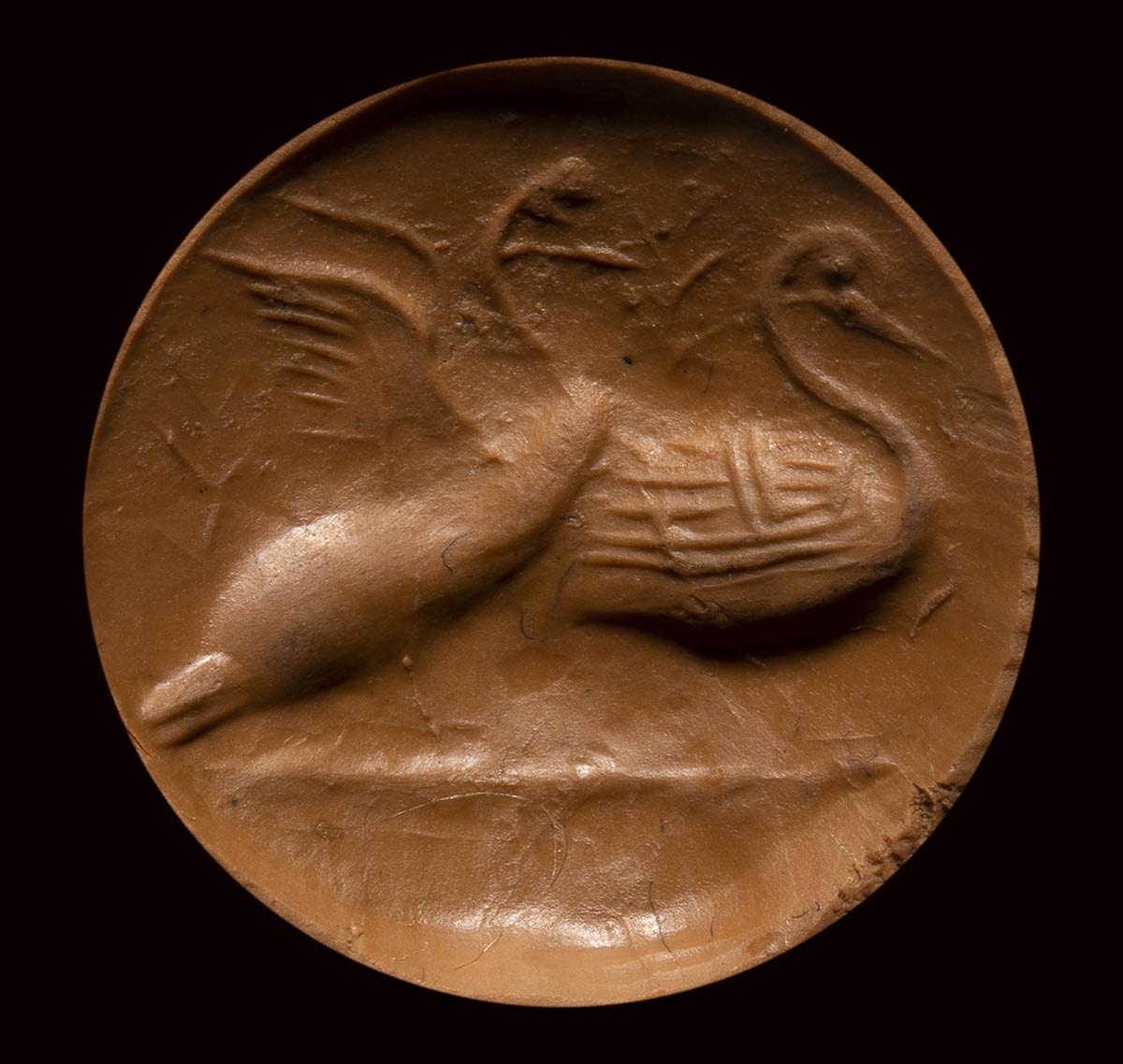 A minoan hematite engraved seal. Two swans. - Image 2 of 3