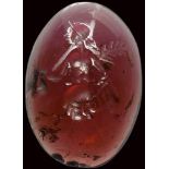 A rare roman garnet intaglio. Hybrid female creature.