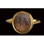 A christian agate intaglio mounted on a modern gold ring.