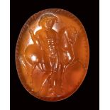 A roman italic carnelian intaglio. Male figure with a horse.