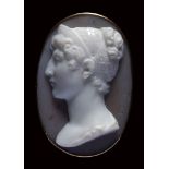 A neoclassical two-layers agate cameo mounted on a gold brooch, signed Berini. Bust of Caroline Mura