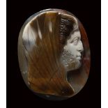 A neoclassical agate cameo. Bust of a veiled man.