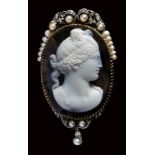 A neoclassical gold, diamonds and pearls brooch set with an agate cameo signed Pestrini.