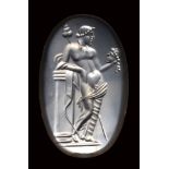 A large roman italic chalcedony intaglio. Dionysos with mask.