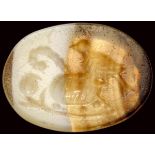 A roman italic banded agate intaglio. Bird with attributes.