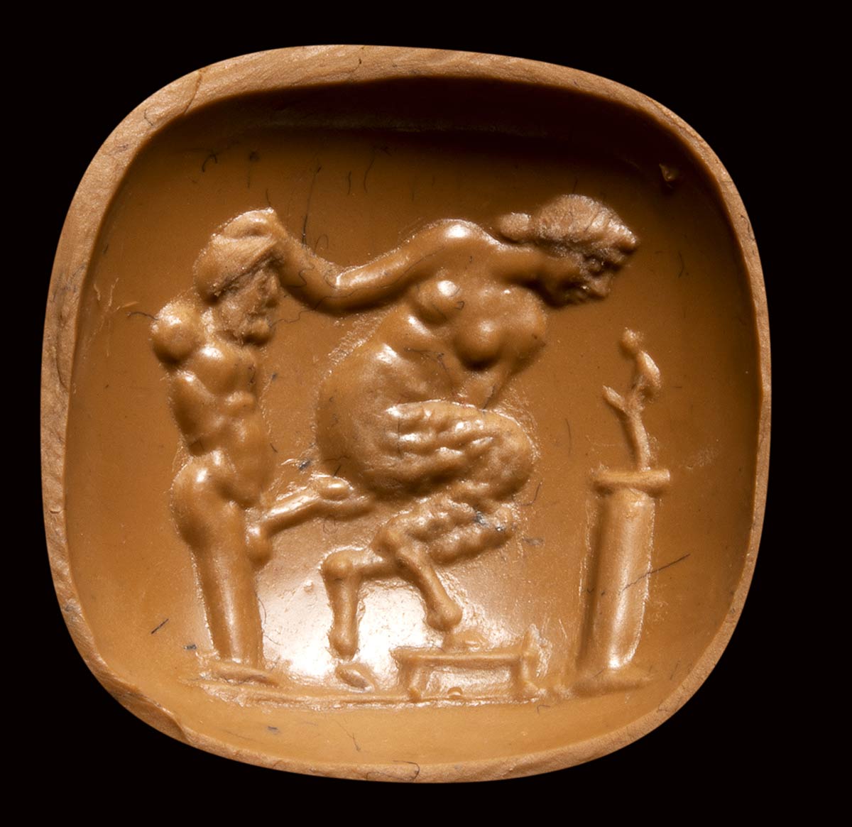 A fine late hellenistic garnet intaglio. Erotic scene with herm. - Image 2 of 4