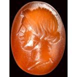 A roman carnelian intaglio. Female head.