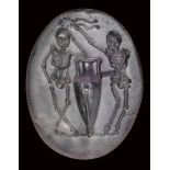 A roman republican amethyst intaglio. Two skeletons with amphora.