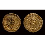 A pair of etruscan gold disc ear-stud.