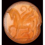 A roman carnelian intaglio. Pegasus.