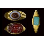 A lot of three roman gold rings with stones intaglio and glass.