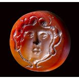 A large early medieval agate intaglio. Medusa mask.
