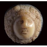 A late roman onyx cameo. Medusa mask.