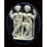 A large roman blue and white glass cameo. Bacchus and Ariadne