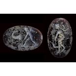 A late hellenistic two-faced glass intaglio. Eros with stag & Eros with a dog.
