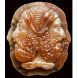 A roman agate cameo. Four conjoined heads (Janus).