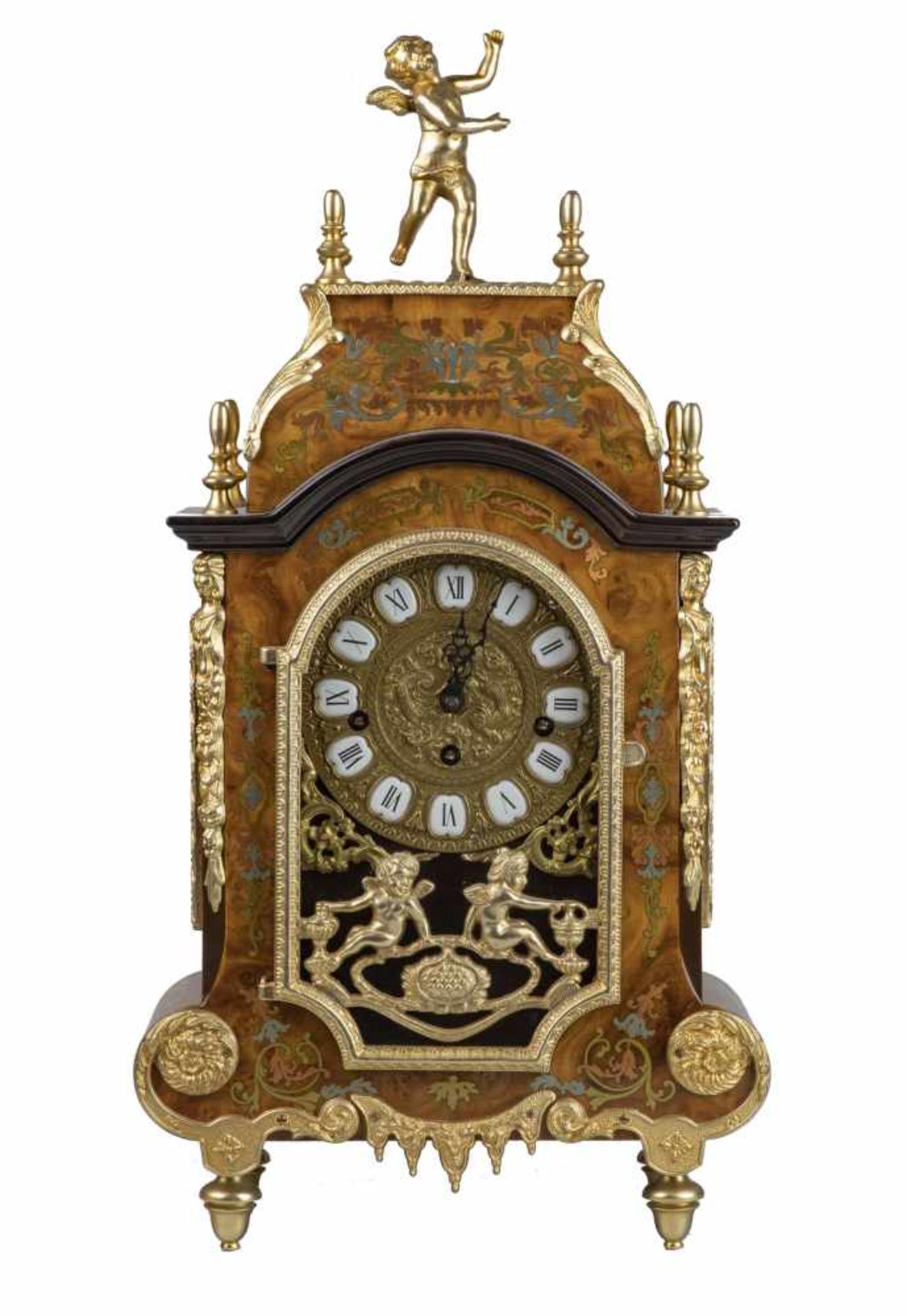 HORLOGE DE STYLE NAPOLEON IIIEn loupe de noyer marqueté et incrustations de filets en laito