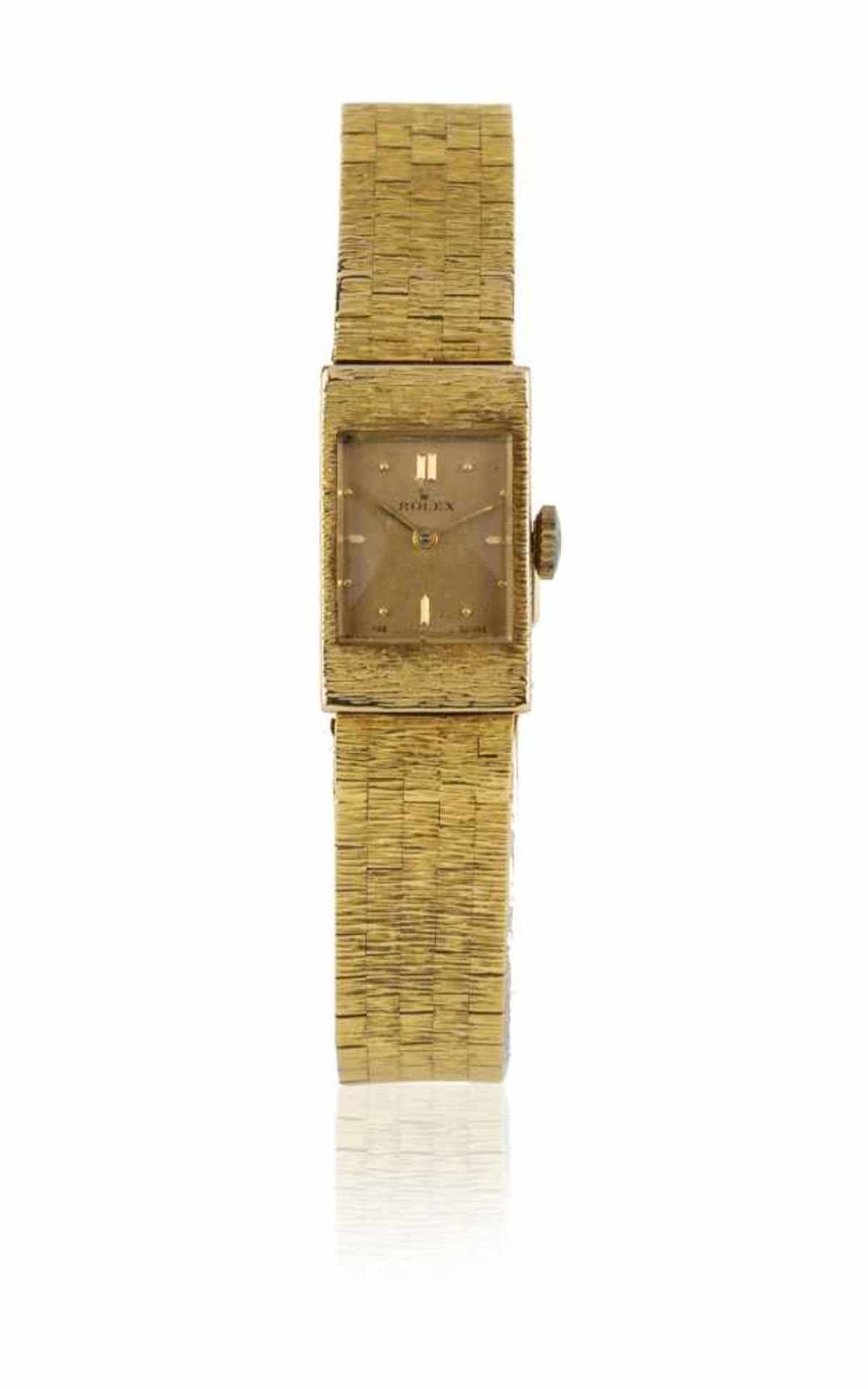 ROLEXMontre bracelet dameEn or jaune 18k (750), boîtier rectangulaire vers 1930, cadran cha