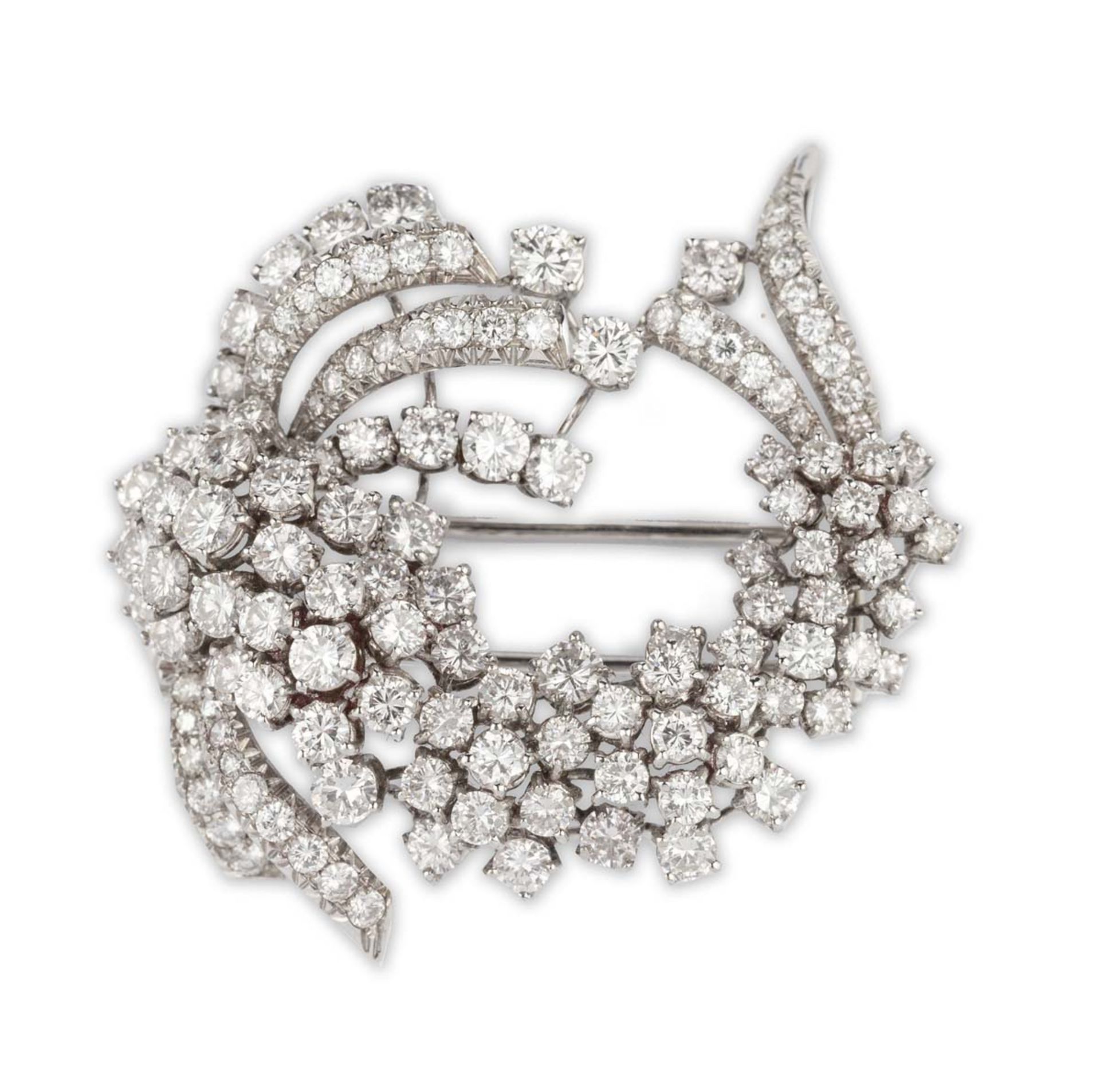 BROCHE FLEUREn or gris 18k (750) à forme de fleur sertie de diamants taillés en brillant.Poids