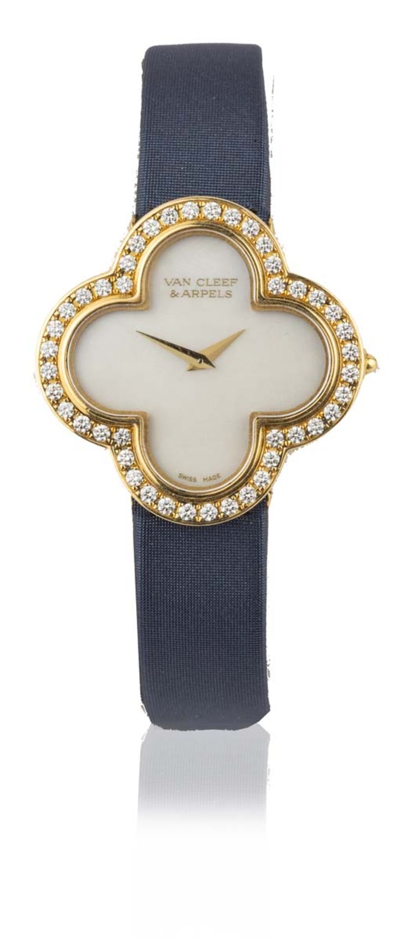 VAN CLEEF & ARPELSMontre "Alhambra"En or jaune 18k (750), boîtier à forme de trèfle, lunette