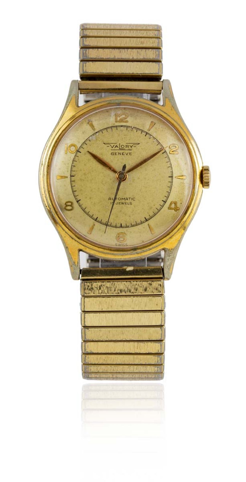 VALORY, GENEVEMontre bracelet militaire en métal doré vers 1940, cadran beige patiné, indicateur à