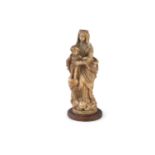 AN ITALIAN CARVED ALABASTER MOTHER AND CHILD GROUP, probably 17th century, on oval timber base, 21cm