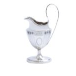 AN IRISH GEORGE III BRIGHT CUT SILVER EWER, Dublin 1908, mark of Charles Lambe, the fluted body with