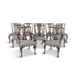 A SET OF TEN GEORGE III MAHOGANY FRAMED DINING CHAIRS, 19th century, in the Chippendale taste,