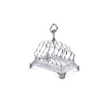 A VICTORIAN SILVER SIX-BAR TOAST RACK, Sheffield c.1882, mark of Mappin and Webb, with raised