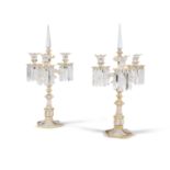 A PAIR OF BOHEMIAN CLEAR AND GILT GLASS LUSTRE CANDLESTICKS, 19th century, each with three scroll