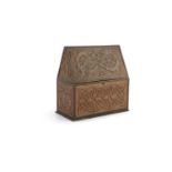 A CELTIC ARTS AND CRAFTS EMBOSSED LEATHER STATIONERY BOX, of rectangular form, with hinged pitched