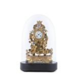 A FRENCH GILT AND PORCELAIN MOUNTED MANTLE CLOCK, by Golay & Cie, Paris, with glass dome and