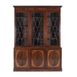 A 19TH CENTURY INLAID MAHOGANY BOOKCASE, fitted three astragal glazed panel doors enclosing a