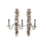 A PAIR OF FLORAL CARVED PAINTED WALL SCONCES, each formed as a floral trail applied with two